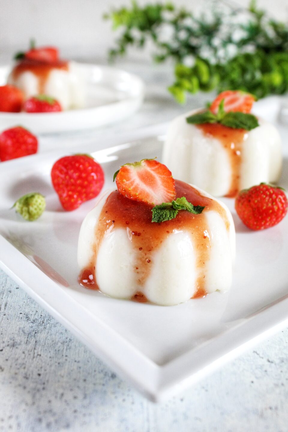 Almond puddings with strawberry coulis